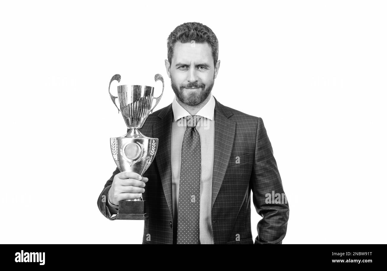 successful man in suit hold champion cup s business reward isolated on white, business success. Stock Photo