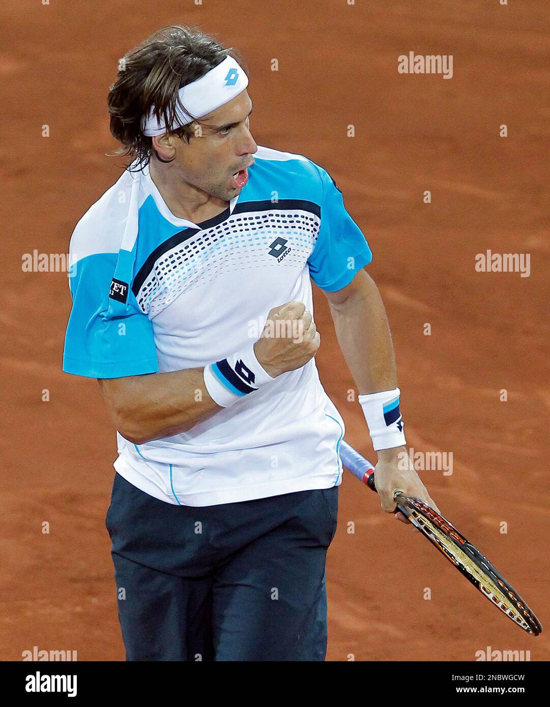 David Ferrer from Spain celebrates during the match against Novak Djokovic  from Serbia in the Madrid Open tennis tournament in Madrid, Friday, May 6,  2011.(AP Photo/Andres Kudacki Stock Photo - Alamy