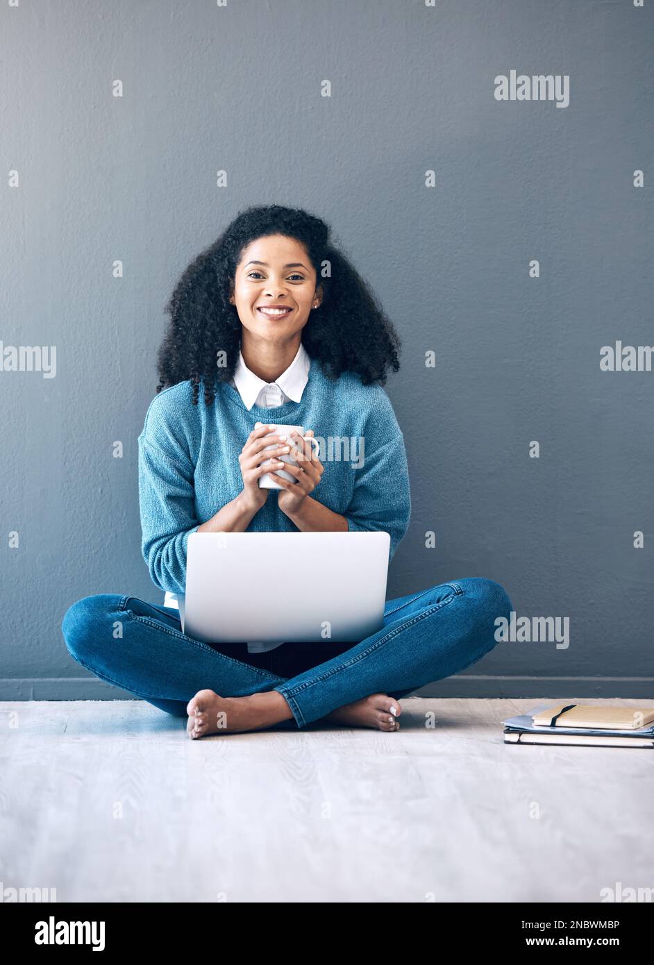 Laptop portrait, mockup or black woman on floor of startup for planning ...