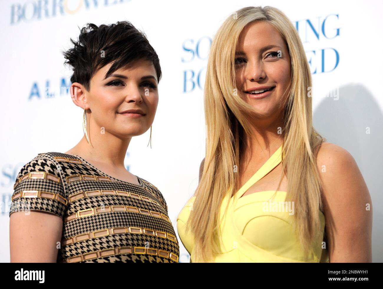 Ginnifer Goodwin, left, and Kate Hudson, cast members in "Something Borrowed," pose together at