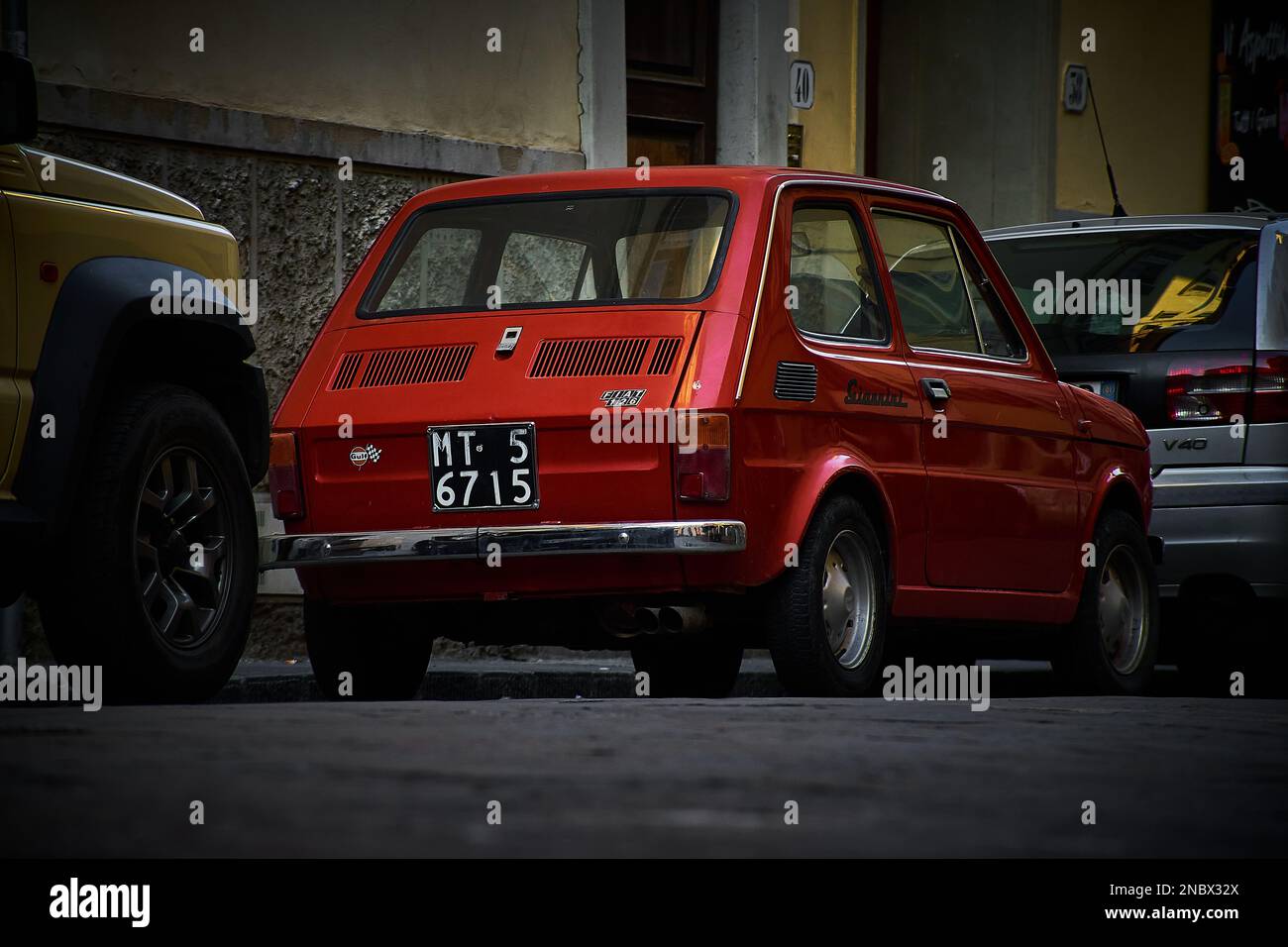 old red car near the street Stock Photo Alamy