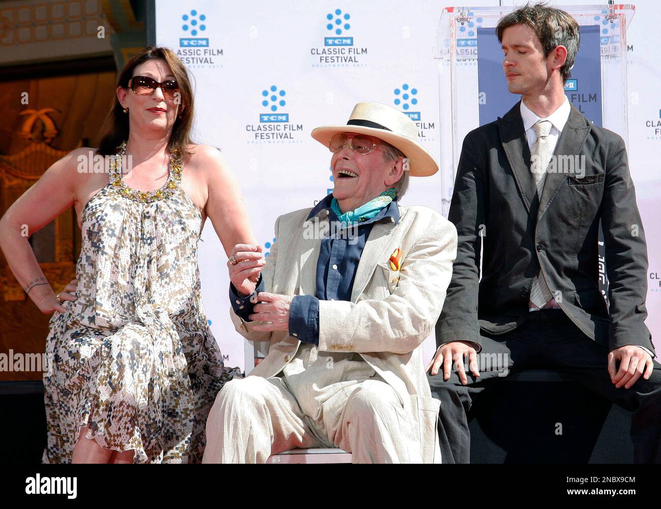 Actor Peter O’Toole, center, sits with his daughter Kate O'Toole, left ...