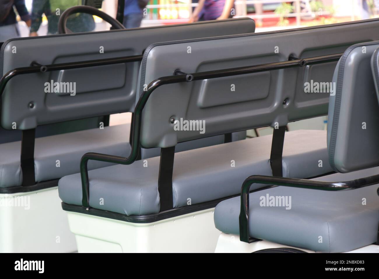 Electric Shuttle Passenger Bus with a view of its seats. Seat of an Golf Car or resort car Stock Photo