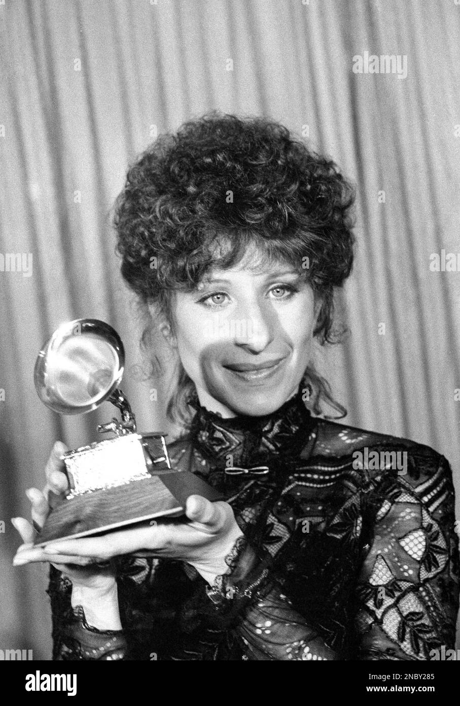 Actresssinger Barbra Streisand holds her award during the Grammy Awards in Los Angeles, Feb. 23
