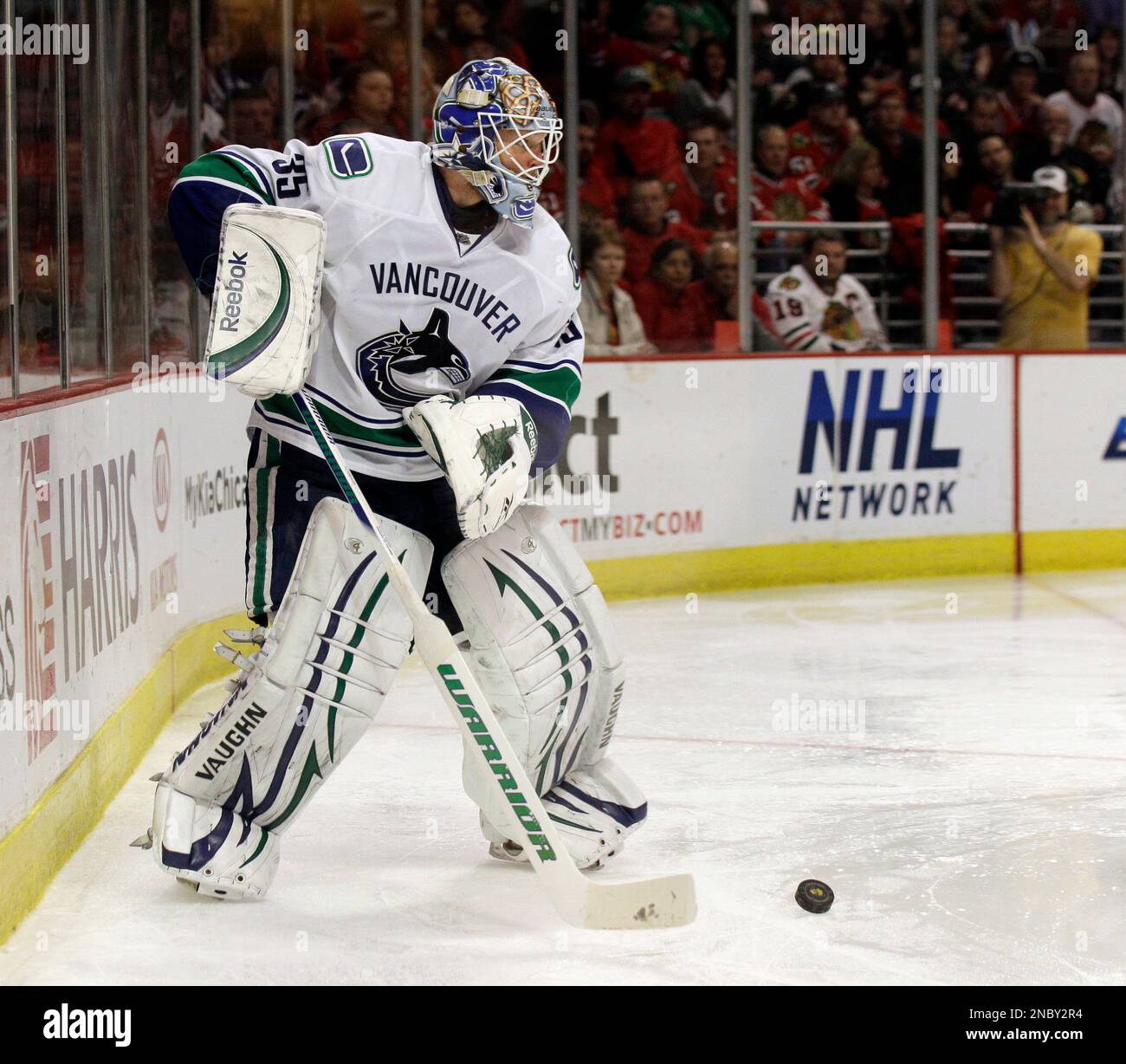 Vancouver Canucks goalie Cory Schneider looks to a pass against the