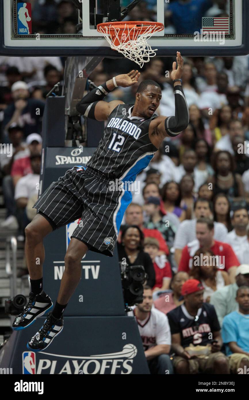 Orlando Magic center Dwight Howard (12) reacts after his dunk against