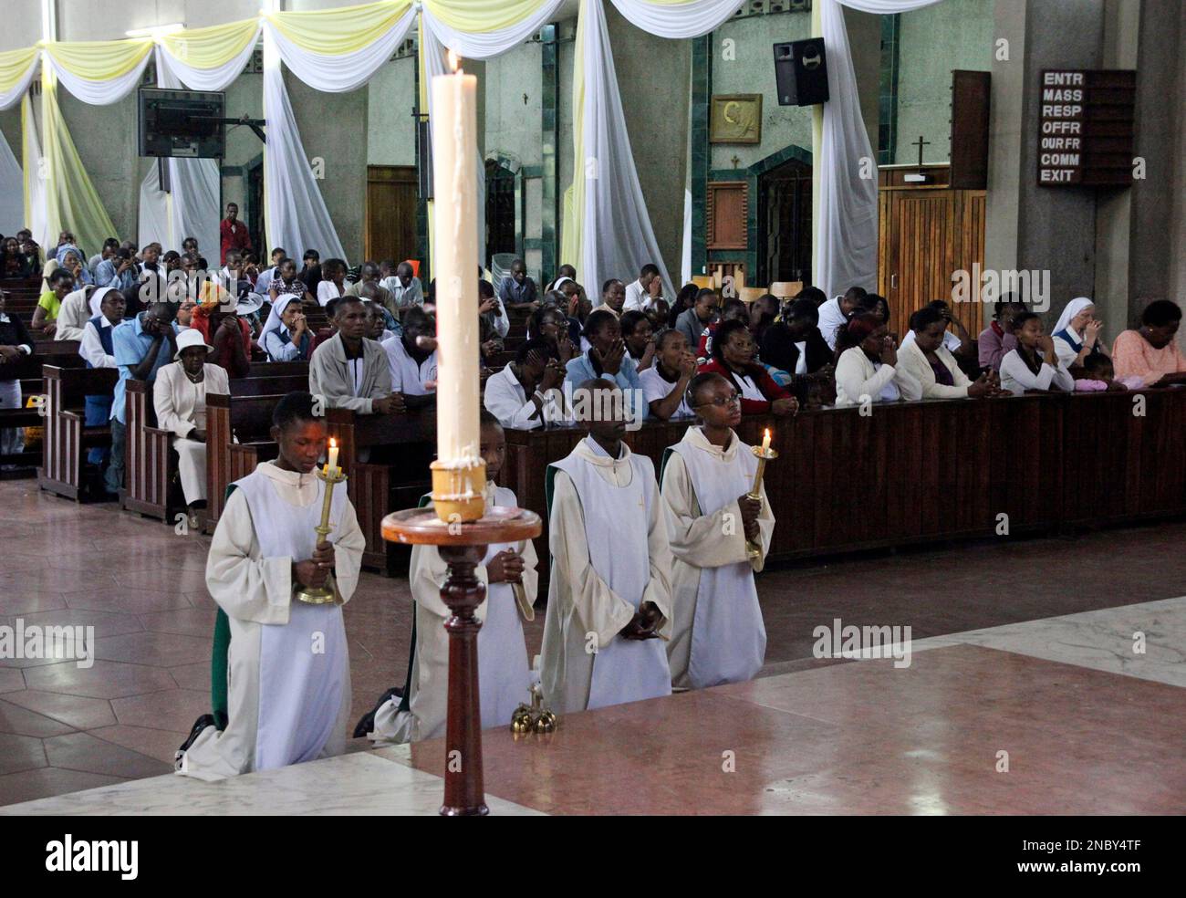 Kenyan Christian join a morning service at Holy Family Basilica in