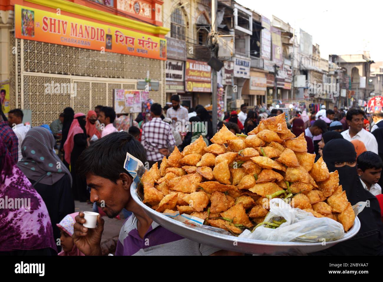 Street food vendor on Laad Bazaar or Choodi Bazaar old market located around the historic Charminar Hyderabad India Andhra Pradesh Stock Photo