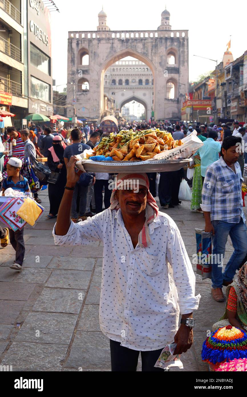 Street food vendor on Laad Bazaar or Choodi Bazaar old market located around the historic Charminar Hyderabad India Andhra Pradesh Stock Photo