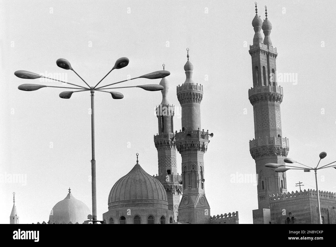 Modern lights contrast with minarets of Sultan El Ghuri Mosque in Cairo, Egypt in 1977. (AP