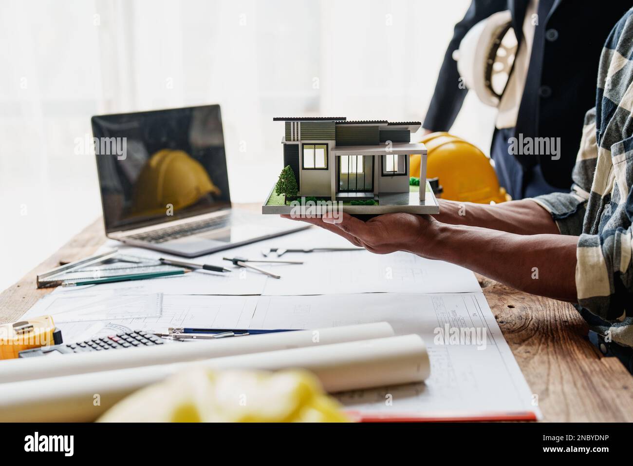 Group of professional engineering people brainstorming at meeting and ...