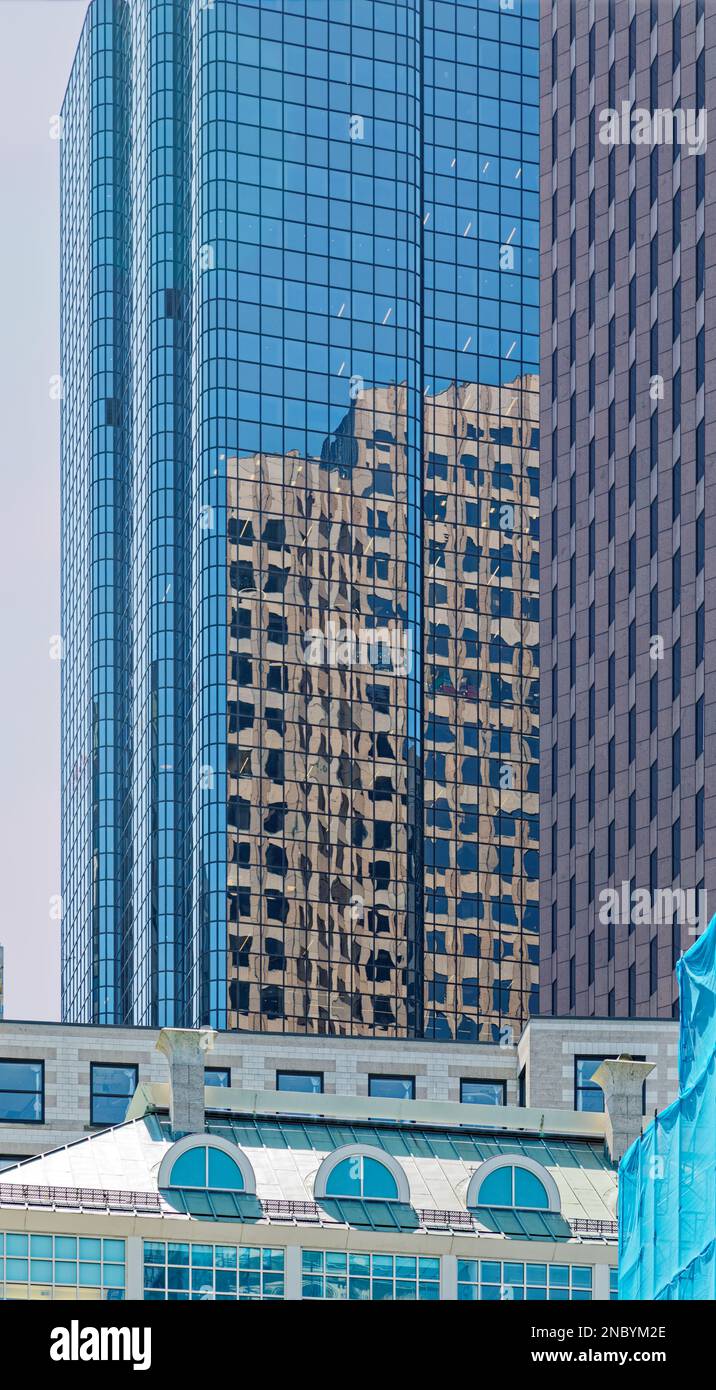 The blue glass of Exchange Place Boston (53 State Street) reflects 60 ...