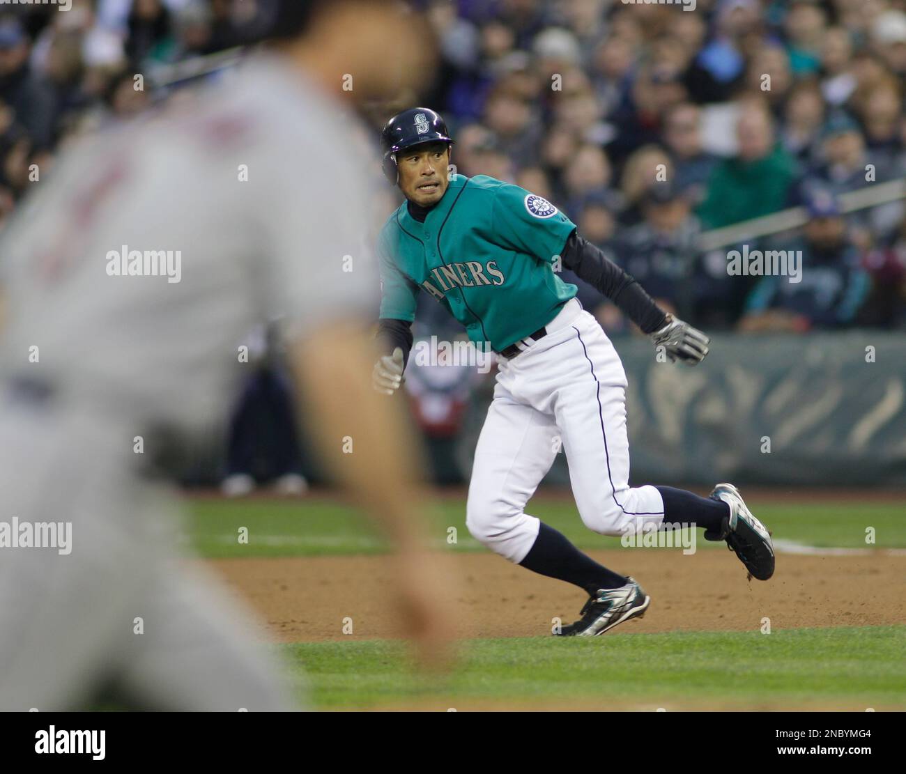 Seattle Mariners' Ichiro Suzuki leads off from first base in the first
