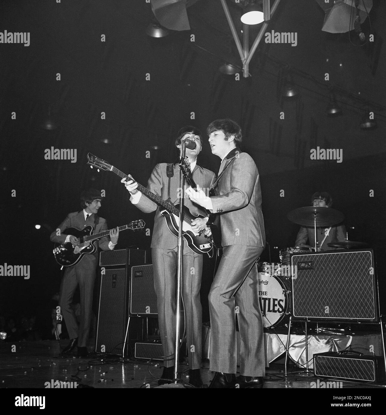 Surrounded by amplifiers and treading jumping beans underfoot, the