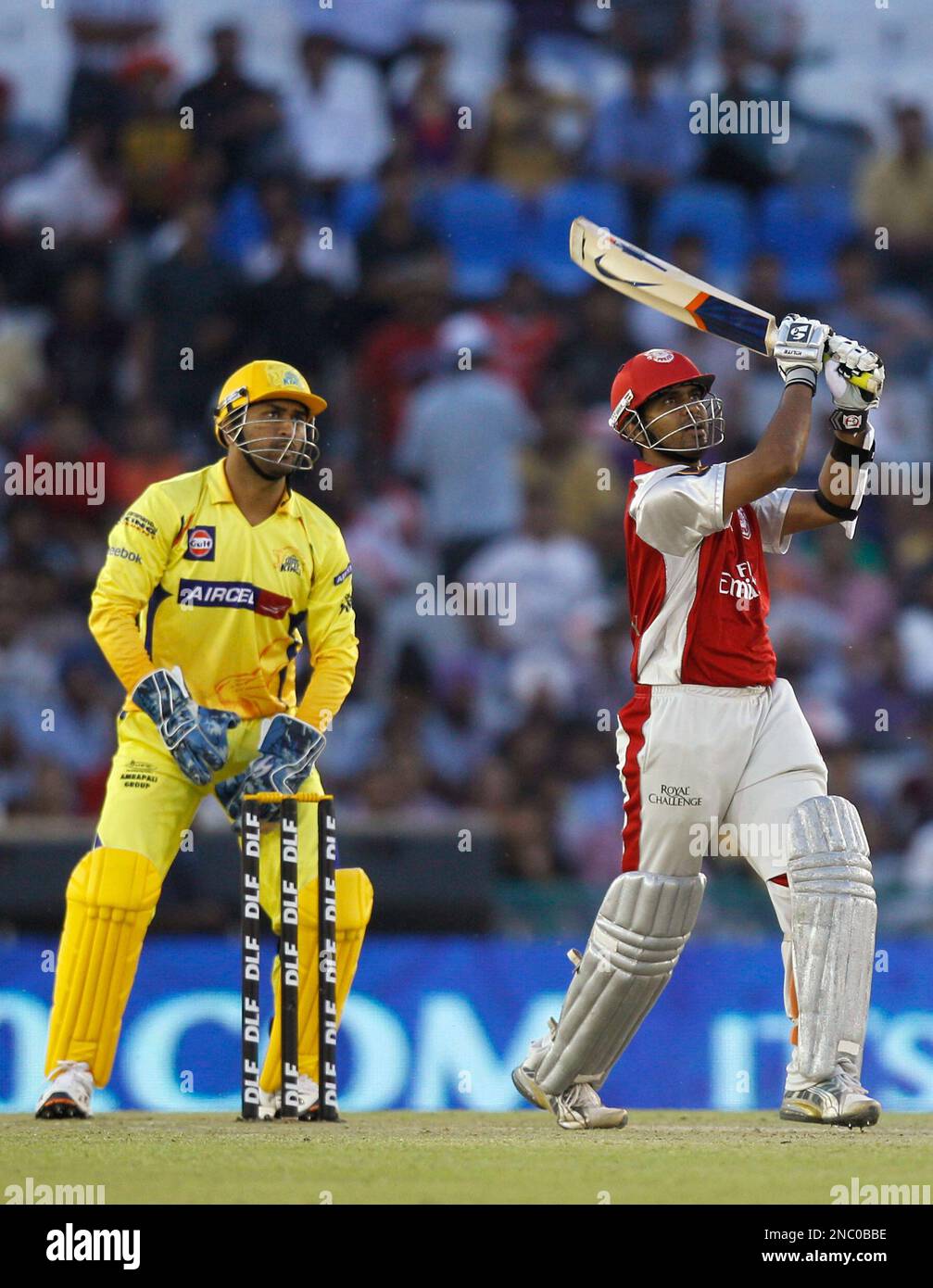 Kings XI Punjab's Paul Valthaty, right, and Chennai Super Kings