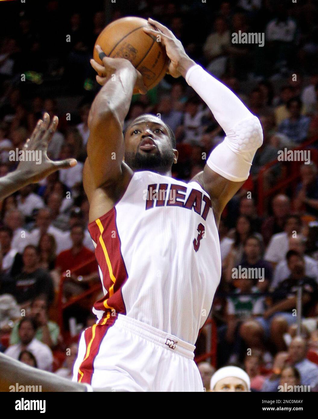 Miami Heat's Dwyane Wade goes up for a shot against the Boston Celtics