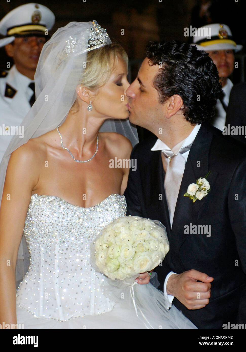 In this April 5, 2008 photo, Peruvian opera tenor Juan Diego Florez kisses his wife, Australian Julia Trappe Florez, after their wedding in Lima, Peru. Juan Diego Florez assisted two mid-wives as they helped Julia deliver their first child, Leandro Florez at 12:25 p.m., on Saturday, April 9, 2011, in New York. Juan Diego Florez was able to hold his son for a moment before rushing off for his 1 p.m. performance at the Metropolitan Opera. (AP Photo/Karel Navarro) Stock Photo
