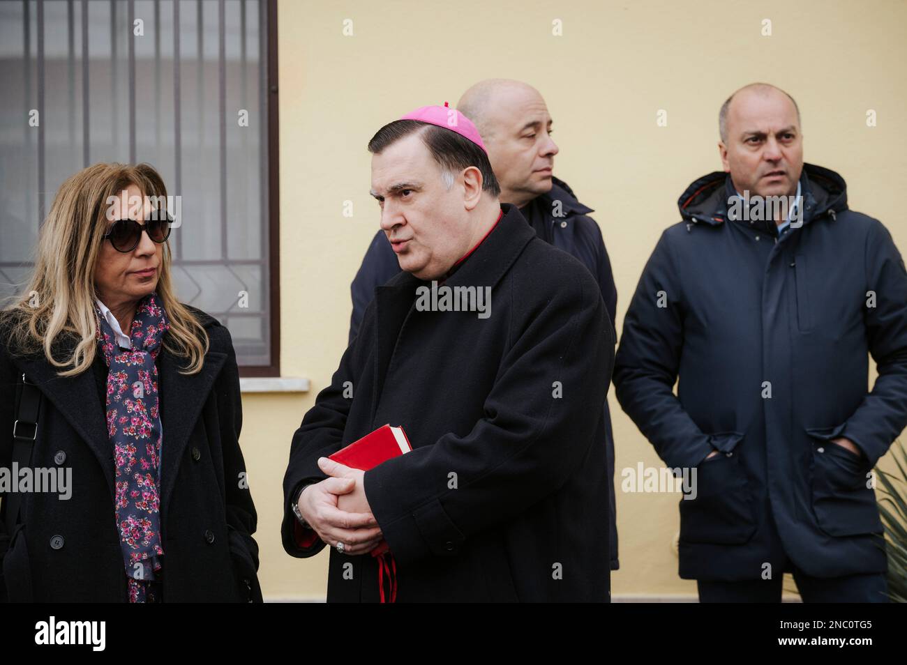 Catanzaro, Italy. 13th Feb, 2023. Mons. Claudio Maniago (C), Metropolitan Archbishop of Catanzaro, seen talking with a lady. The Italian Minister of Interior Matteo Piantedosi attended the inauguration of the operative Anti-mafia Investigation Department (DIA - Direzione Investigativa Antimafia) The Minister also attended the provincial meeting for order and public security and the signature for a protocol for re-usage of buildings and assets seized from organise crime. (Photo by Valeria Ferraro /SOPA Images/Sipa USA) Credit: Sipa USA/Alamy Live News Stock Photo