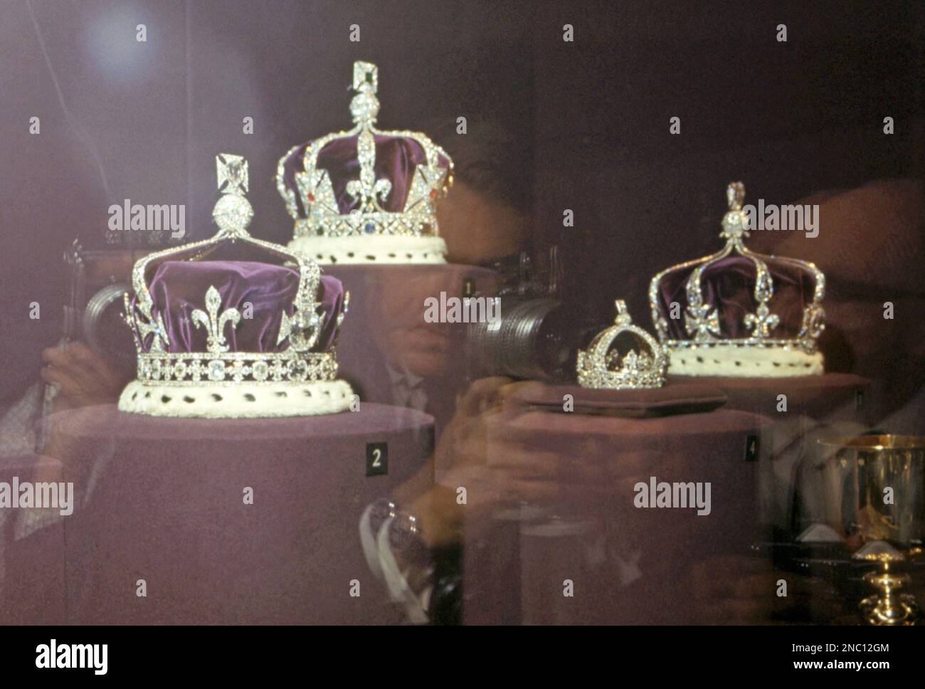 File photo dated 05/07/67 of crowns on display in the Upper Chamber of the Crown Jewel House at the Tower of London, showing the Imperial Crown of India (left), the crown made for Queen Elizabeth the Queen Mother in 1937, bearing the Koh-i-Noor, the Crown of Queen Mary, and the small crown of Queen Victoria. The controversial Koh-i-noor diamond will not feature in the coronation of the Queen Consort, with Camilla opting to reuse the crown it was once set in instead. The famous gem was first set in a cross at the front of Queen Mary's crown when it was worn at her coronation in 1911 but it was  Stock Photo