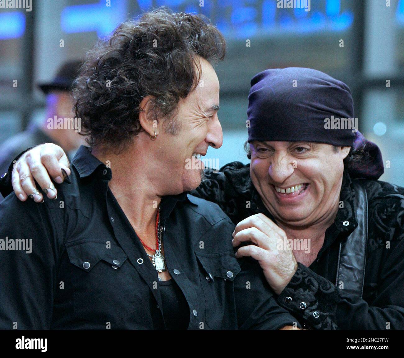 FILE - In this Sept. 28, 2007 file photo, Bruce Springsteen, left, and band member Steven Van Zandt get together between songs when they appeared on the NBC "Today" television program in New York's Rockefeller Center. With old friend Springsteen stopping by to swap music stories for the ninth anniversary of Van Zandt's rock radio show, Van Zandt laughed at the notion that he'd set the bar pretty high for the tenth year. "It's been an open invitation," said Van Zandt, guitarist in Springsteen's E Street Band. "He just finally got around to it." (AP Photo/Richard Drew, File) Stock Photo