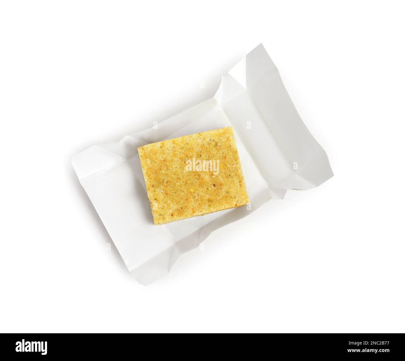Unwrapped bouillon cube on white background, top view Stock Photo