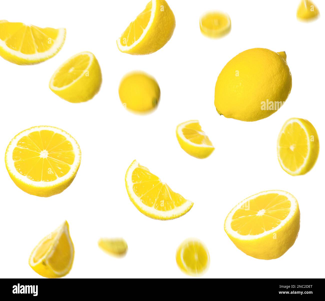 Fresh ripe lemons falling on white background Stock Photo Alamy
