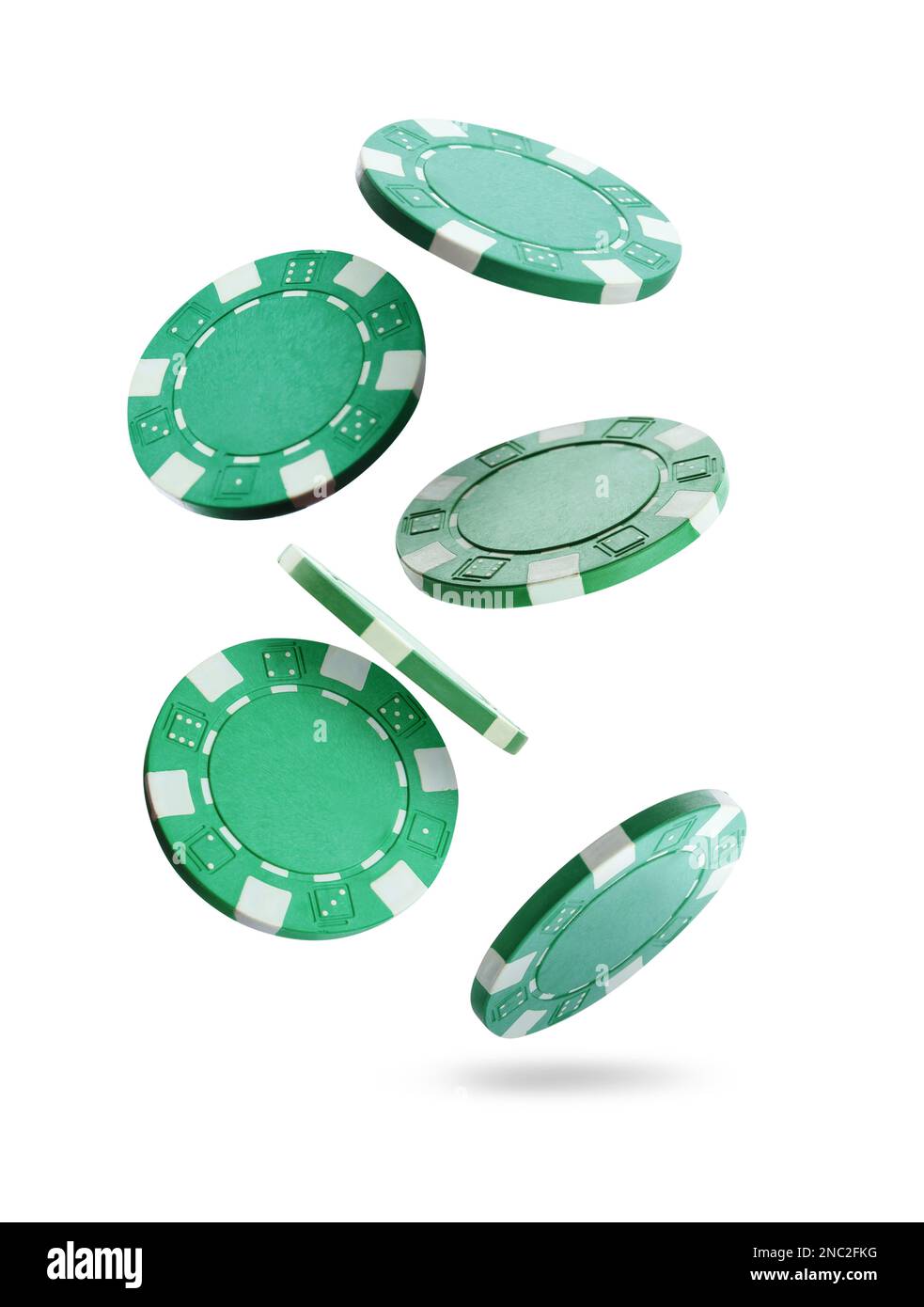 Green casino chips falling on white background Stock Photo Alamy