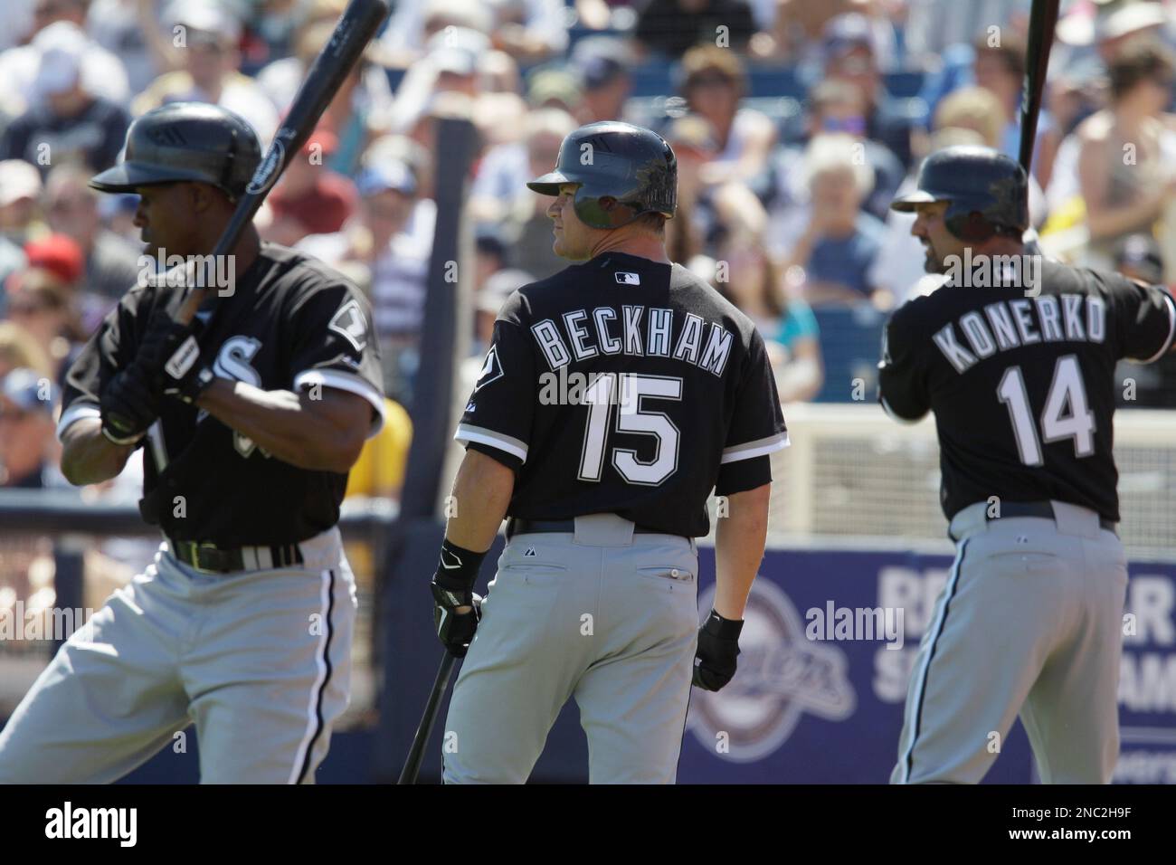 Chicago White Sox's Gordon Beckham looks to the field between Juan Pierre, left, and paul Konerko before the White Sox's spring training baseball game against the Milwaukee Brewers on Sunday, March 27, 2011, in Phoenix. (AP Photo/Nam Y. Huh) Stock Photo