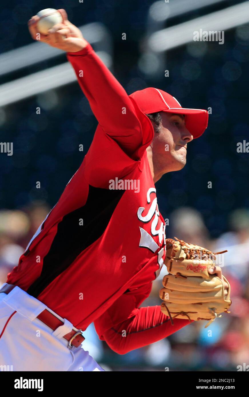 Cincinnati Reds starting pitcher Scott Carroll throws to the Arizona ...