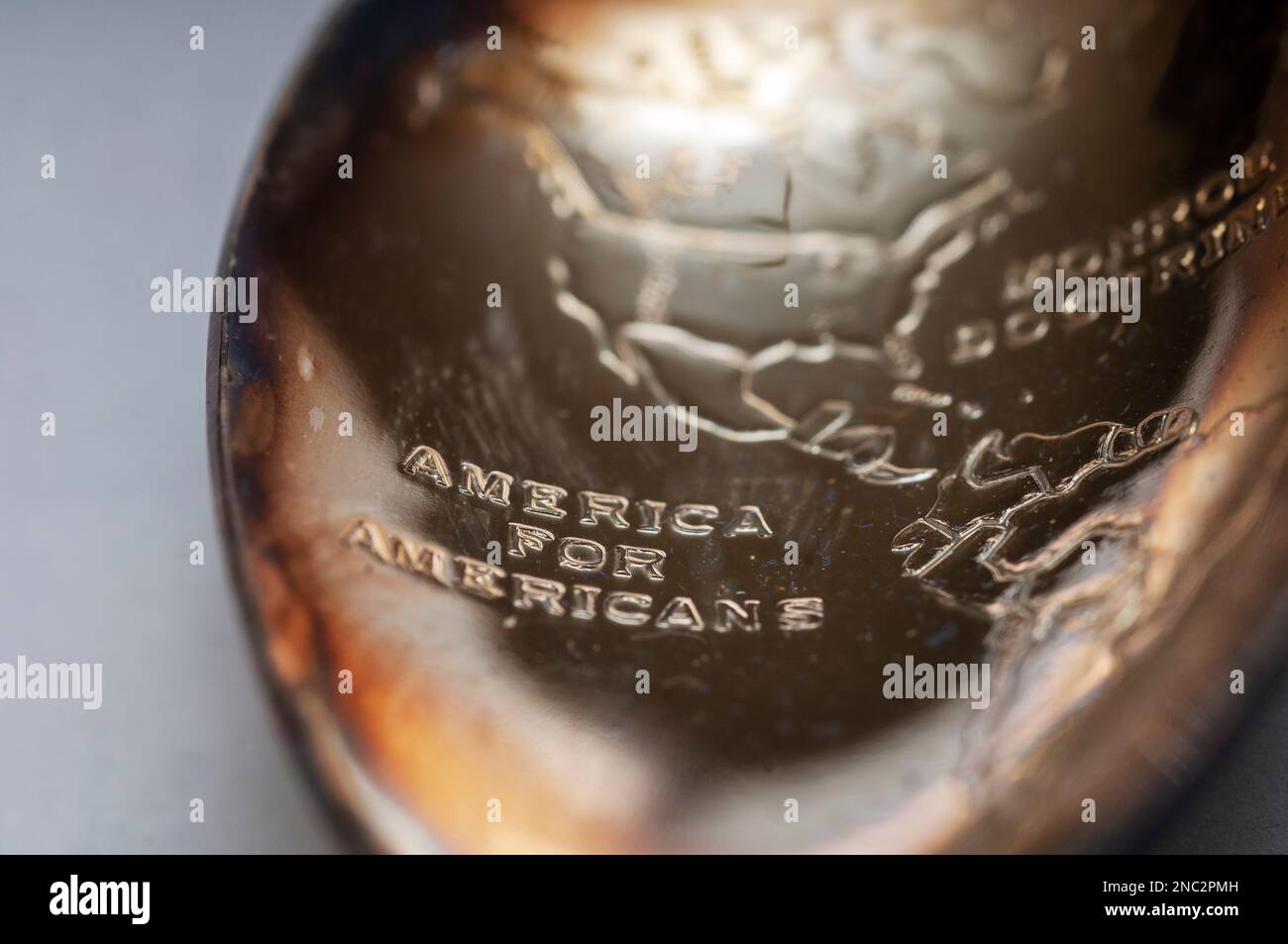 Tarnished Wm Rogers silver plate Americana spoon commemorating the Monroe Doctrine with the inscription “America For Americans”, on Monday, February 6, 2023. (© Richard B. Levine) Stock Photo