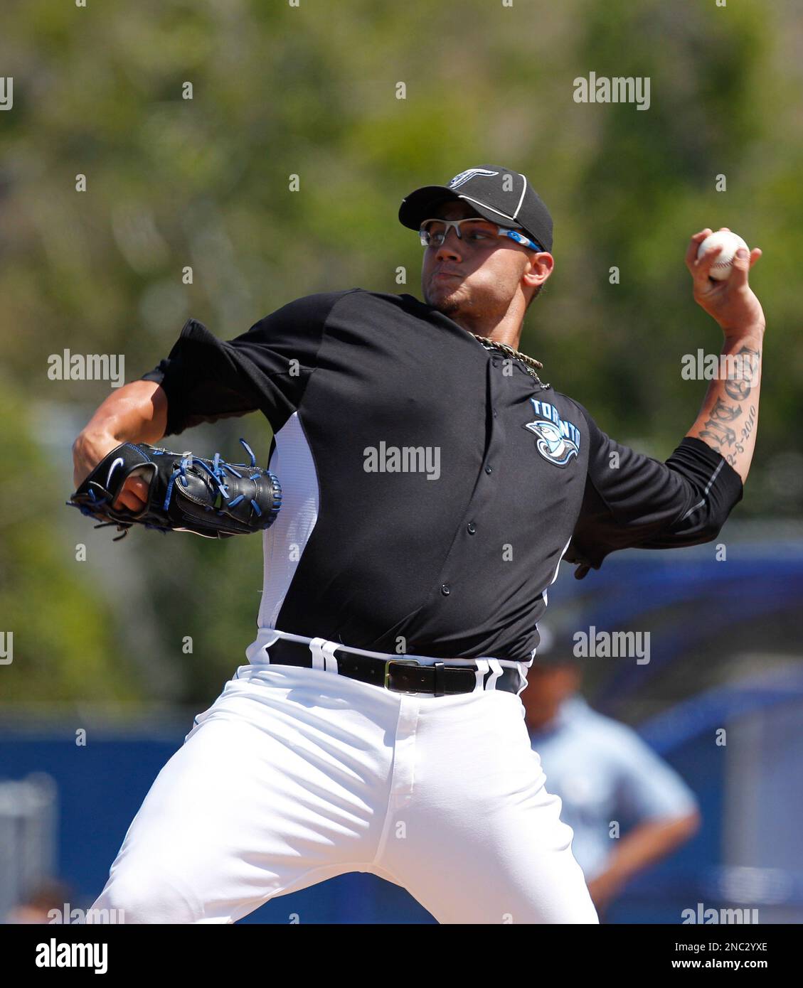 Toronto Blue Jays starting pitcher Brett Cecil winds up against the Atlanta Braves in their spring training baseball game at Florida Auto Exchange Stadium in Dunedin, Fla., Thursday, March 24, 2011. (AP Photo/Kathy Willens) Stock Photo