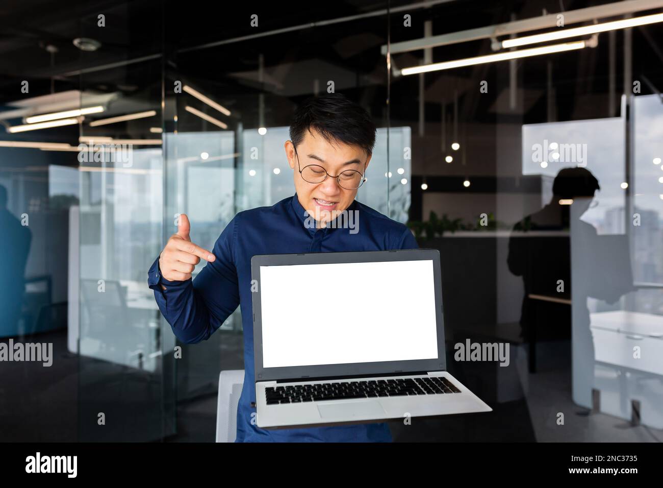 Worried and upset young Asian man, programmer, businessman, freelancer ...