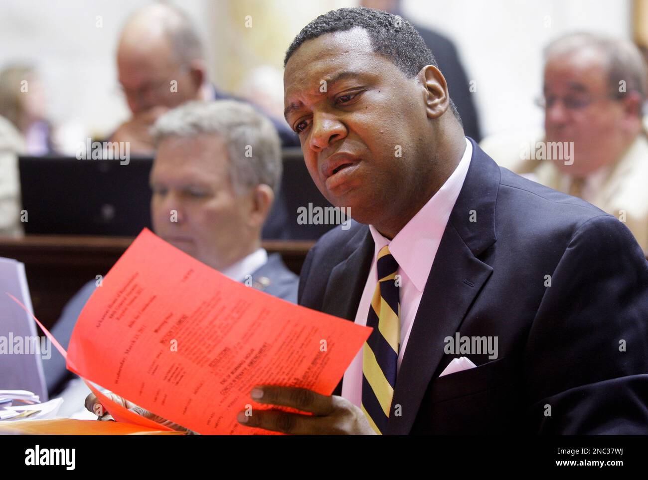 Rep. Tracy Steele, DNorth Little Rock, looks a a House agenda before