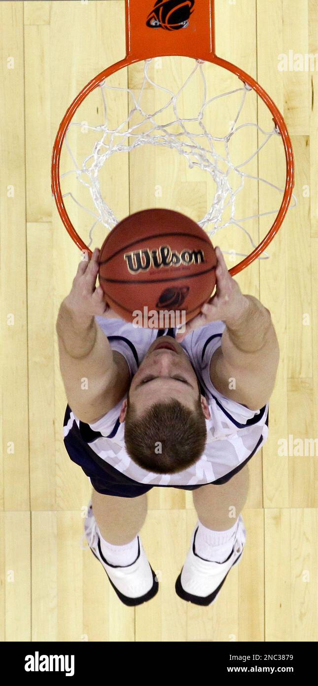 Byu s james anderson dunks during a practice session for their ncaa