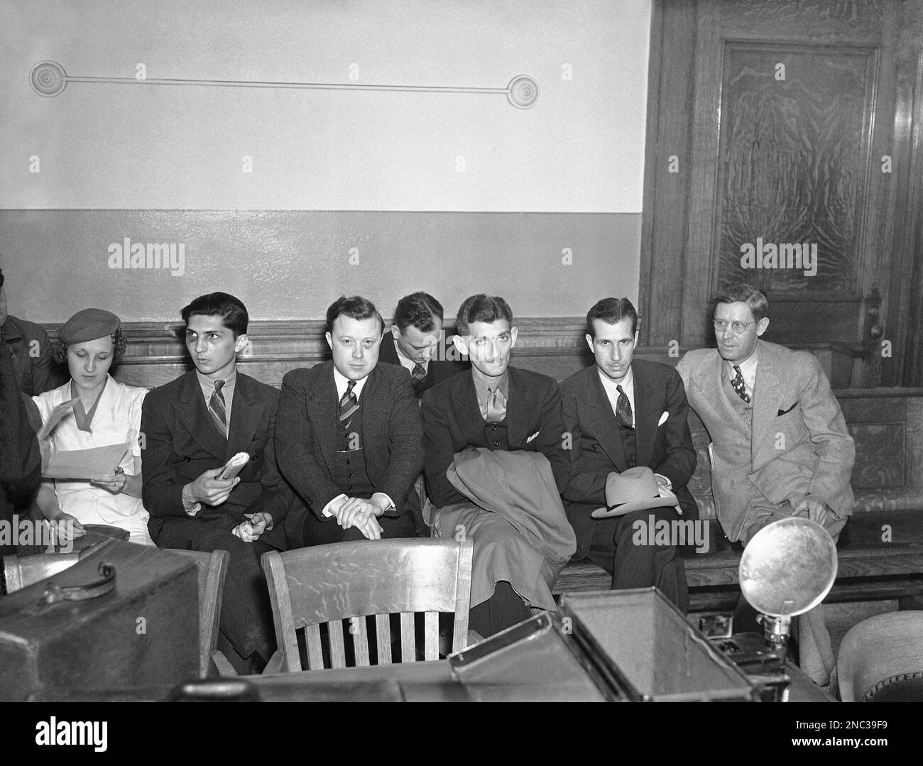 Unionists appear at a grand jury investigation of a scuffle at the Ford Dearborn plant in Detroit, June 3, 1937. From left to right: Alvin Stickle, injured in the fight; Walter Reuther, president of the West Side local of the United Automobile Workers, who was injured: Robert Kanter, union organizer; Robert Sentman, UAW. organizer, and J.J. Kennedy, who is assisting in the drive to organize Ford workers. (AP Photo) Stock Photo