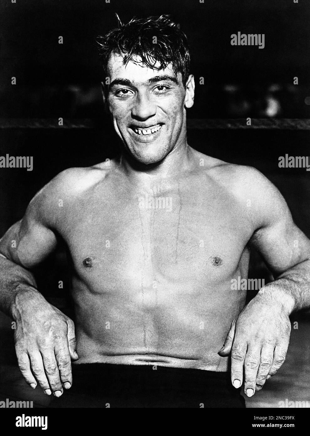 italian-boxer-primo-carnera-known-as-the-ambling-amp-poses-for-a-photo-around-nov-20-1930-soon-he-will-fight-paulino-uzcudun-unseen-ap-photo-2NC39FX.jpg