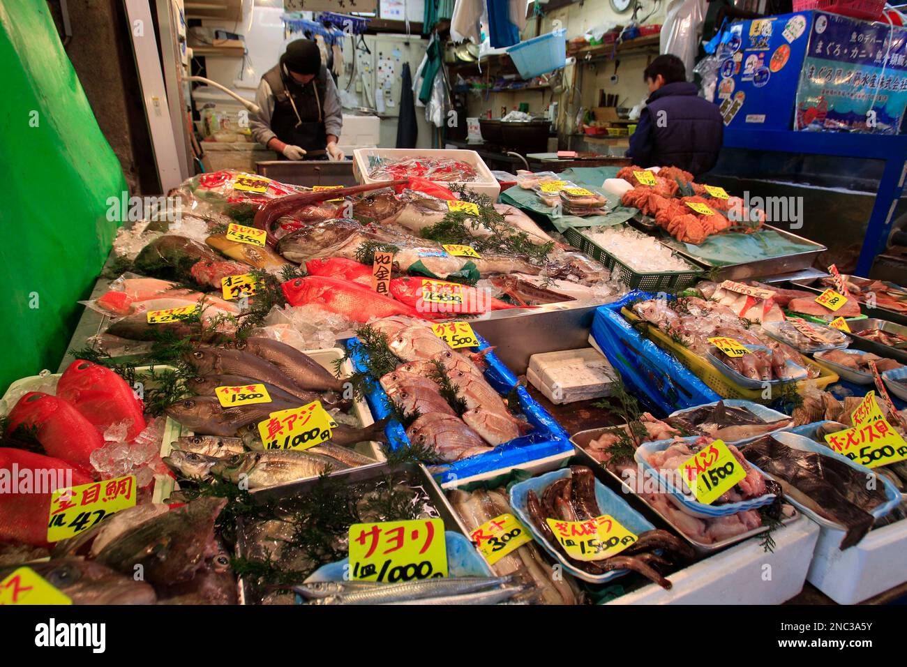 Various types of fish are sold at a shop near Tokyo's Tsukiji fish market  Wednesday, March 23, 2011. (AP Photo/Lee Jin-man Stock Photo - Alamy