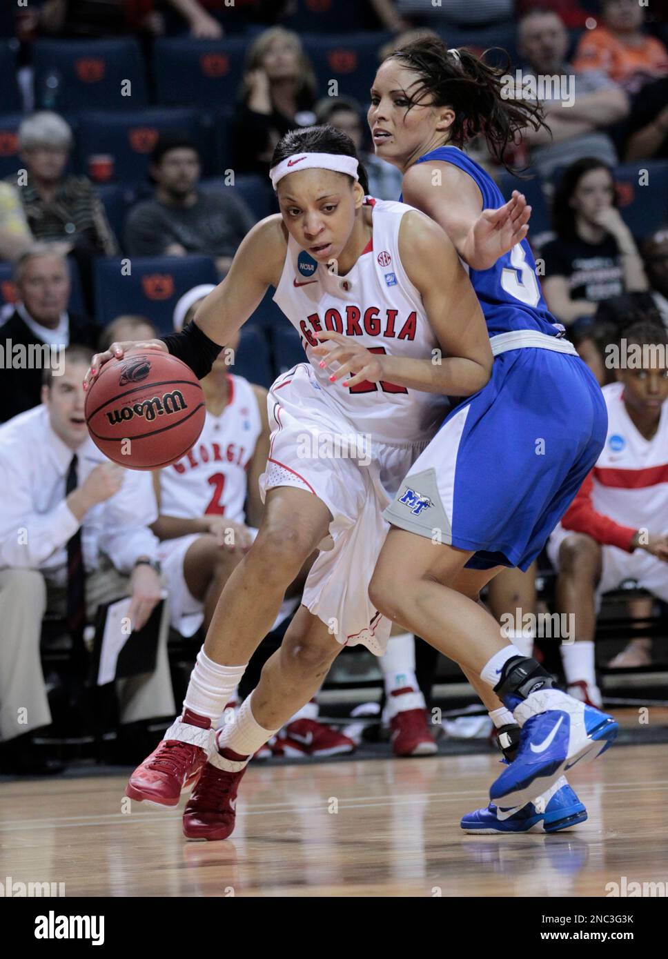 Meredith Mitchell (11) drives around Middle Tennessee State's