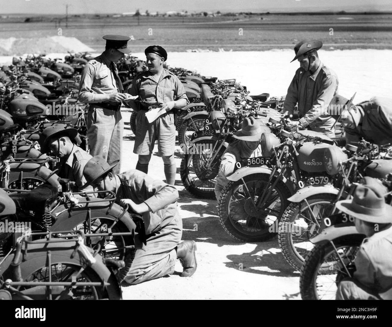 Dispatch riders overhaul their machines on Dec. 16, 1940. (AP Photo ...