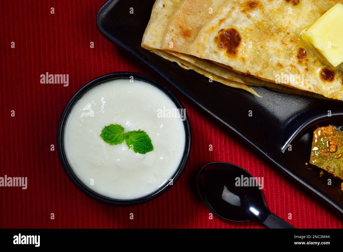 Top view of Yogurt served with paratha, indian food dahi Stock Photo Alamy