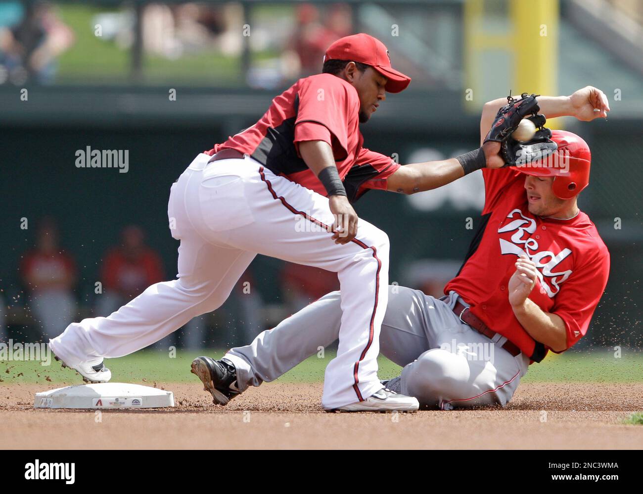 Arizona Diamondbacks shortstop Tony Abreu, left, and Cincinnati Reds ...