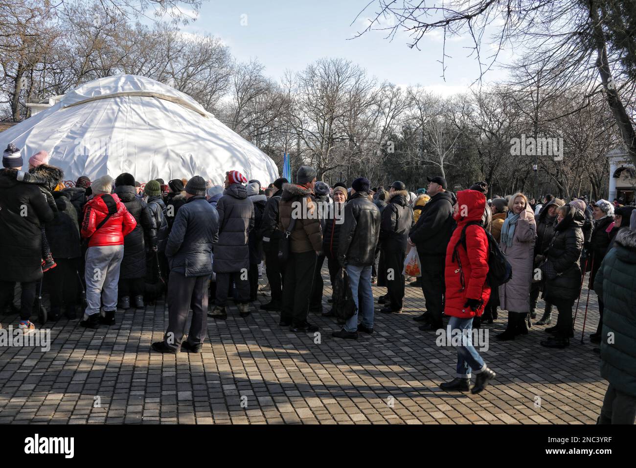 ODESA, UKRAINE - FEBRUARY 12, 2023 - People attends the opening of the Yurt of Invincibility in the Taras Shevchenko Central Park of Culture and Leisu Stock Photo