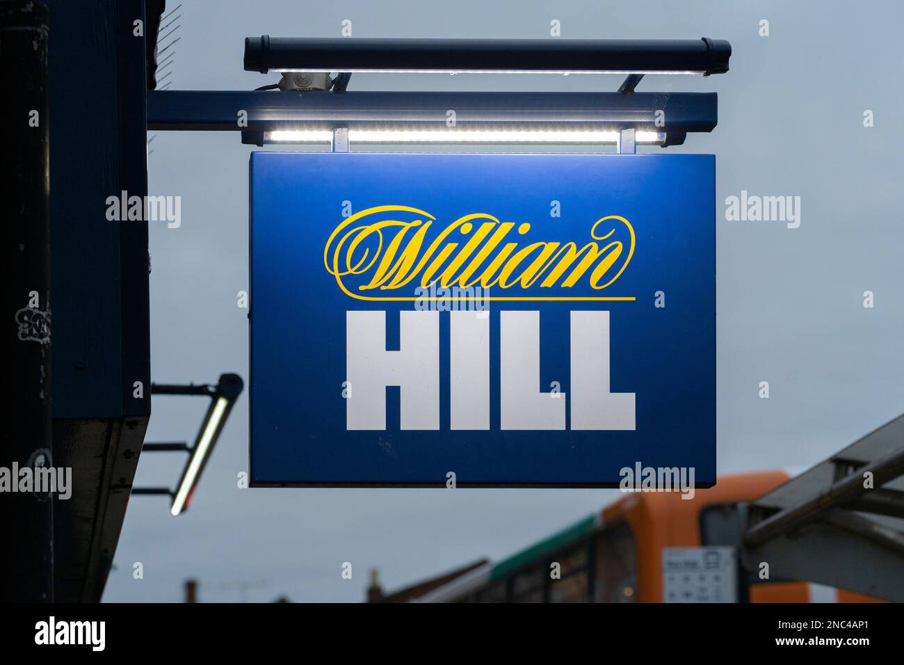 William Hill betting shop hanging sign on Wood Street, Stratford upon Avon, UK. Theme: UK betting industry, problem gamblers, UK gambling industry Stock Photo