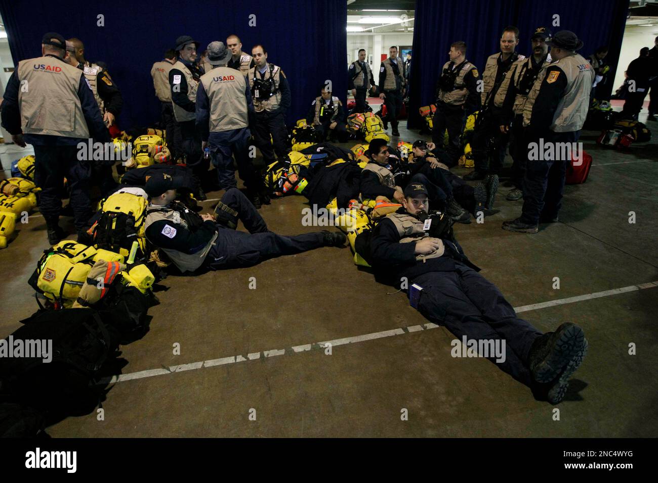 Members of an urban search and rescue team from Fairfax County ...