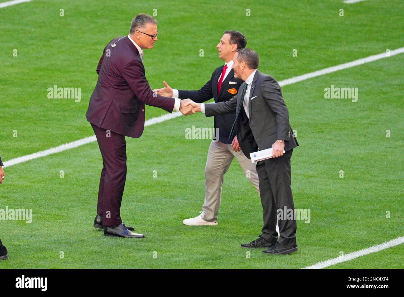 GLENDALE, AZ - FEBRUARY 12: Fox Sports Howie Long shakes hands with ...