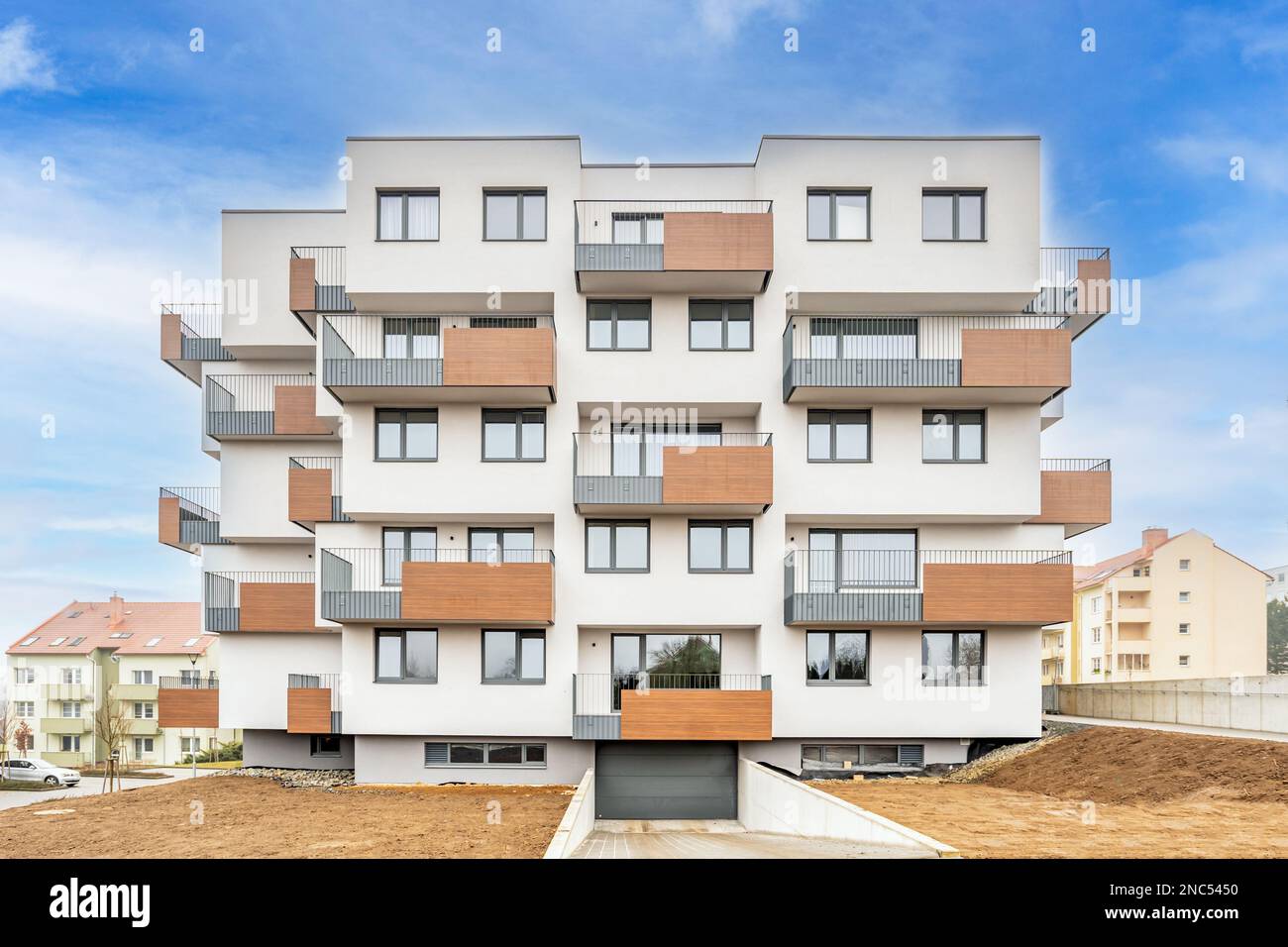 new construction of an apartment building in the city Stock Photo - Alamy