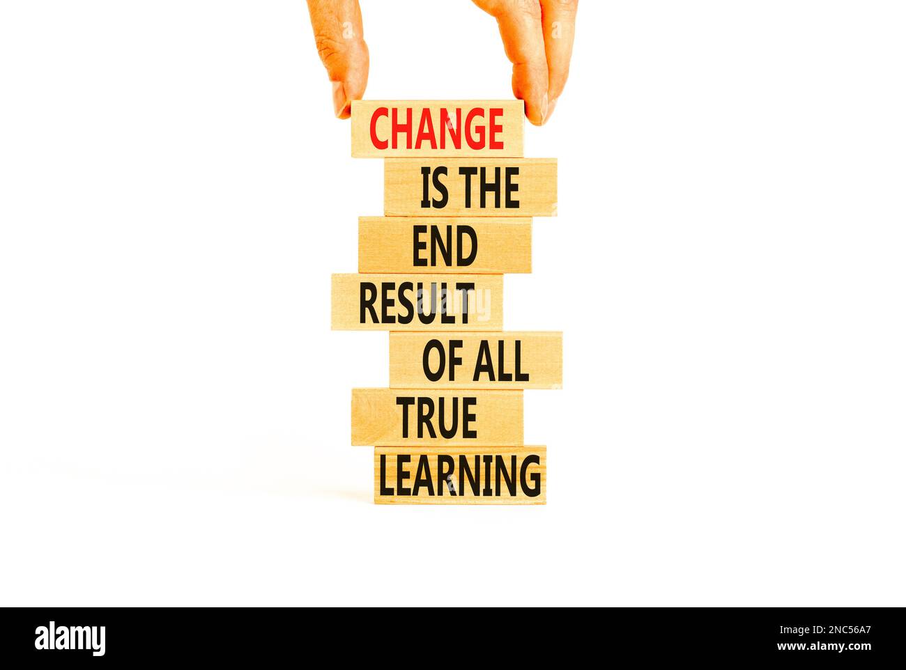 Change symbol. Concept words Change is the end result of all true learning on wooden blocks