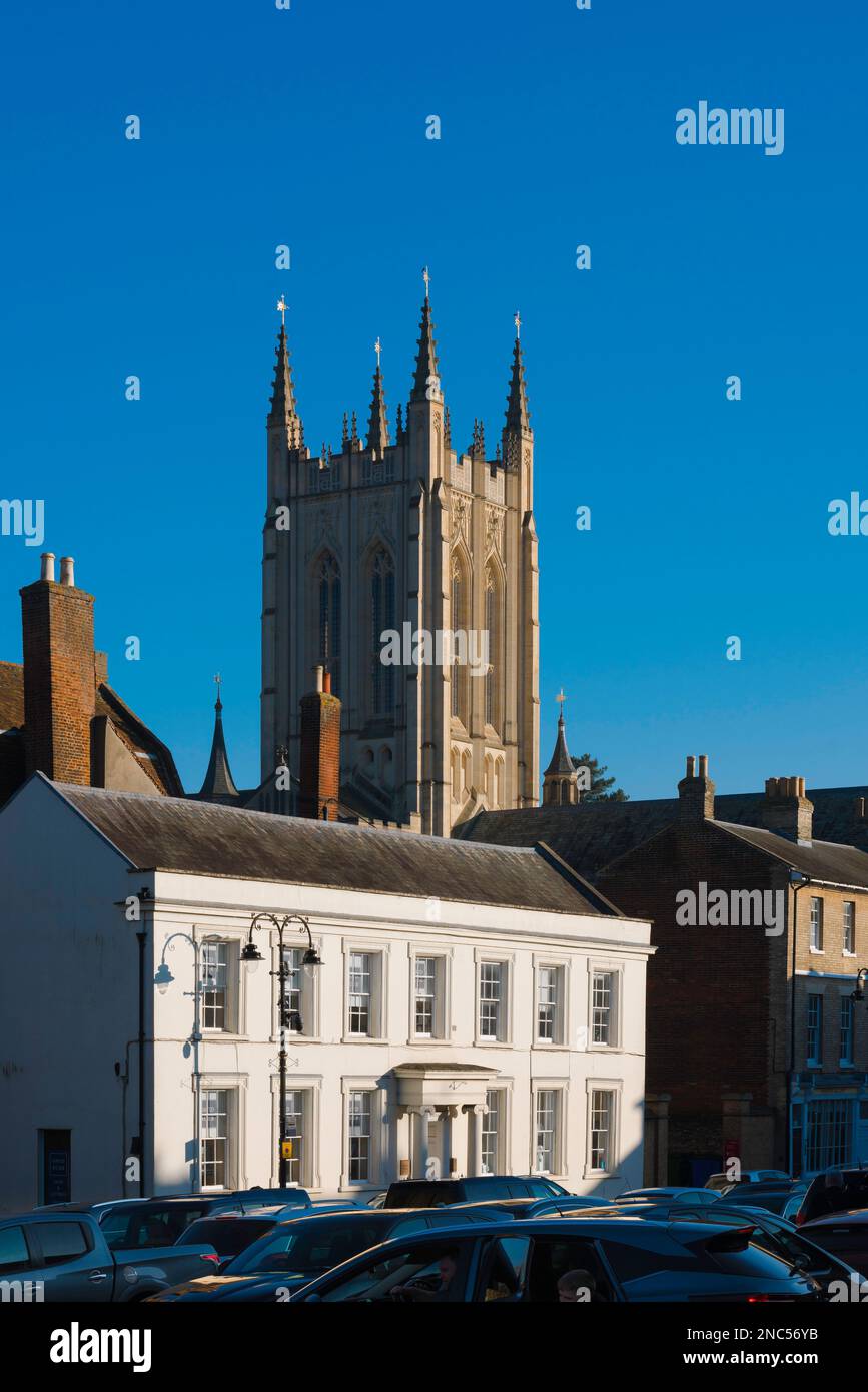 Bury St Edmunds, view of the cathedral tower rising above Georgian era buildings sited in Angel Hill in the historic town centre of Bury St Edmunds Stock Photo