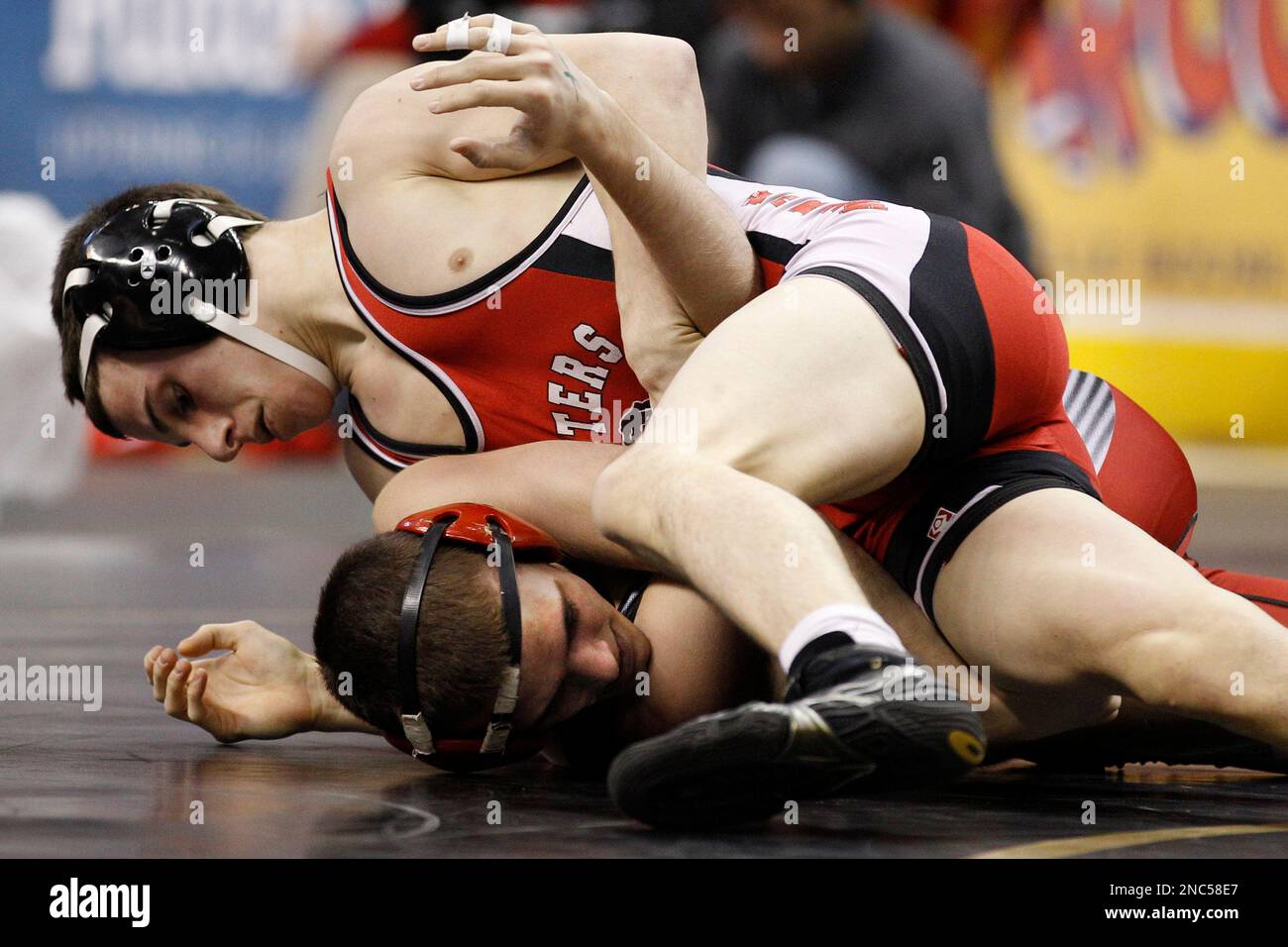 Hatboro Horshams Matt Harkins, top, wresltes with Waynesburgs Derrick Nelson during their Class AAA 119-pound quarterfinal match, Friday, March 11, 2011, at the PIAA High School Wrestling Championships in Hershey, Pa