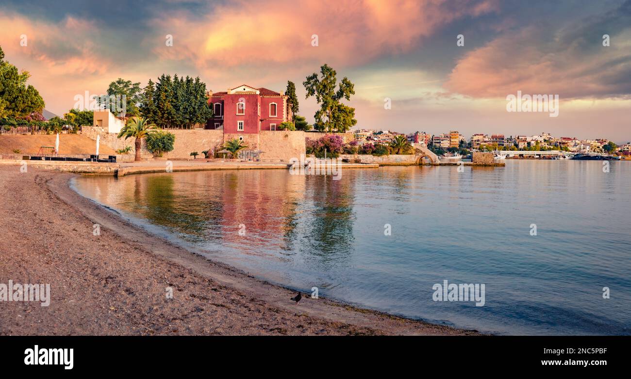 Perfect summer scene of Chalcis town, Greece. Incredible morning seascape of Aegean sea, North Euboean Gulf. Beautiful sunrise in Euboea island, Greec Stock Photo